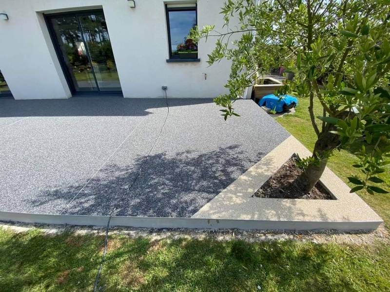 Pose d'un revêtement de sol en granulat de marbre sur une terrasse à Rouen 76 en Seine Maritime